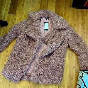 Oversized warm fur coat. Never been worn!